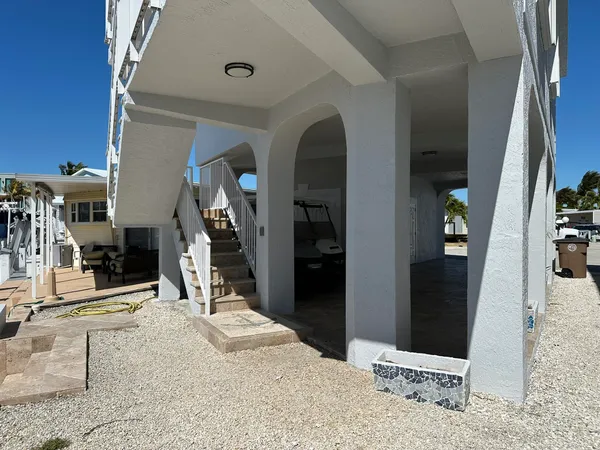 a view of a terrace with chairs
