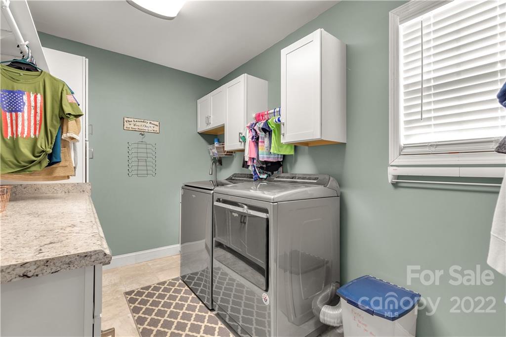 2098 Beamguard Road Clover, SC 29710 - Photo 22 of 36 a kitchen with a sink cabinets and window
