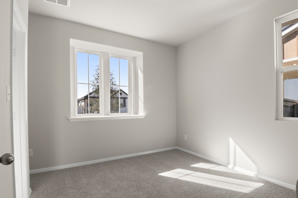 167 Daylily Drive Elgin, TX 78621 - Photo 26 of 29 an empty room with a window