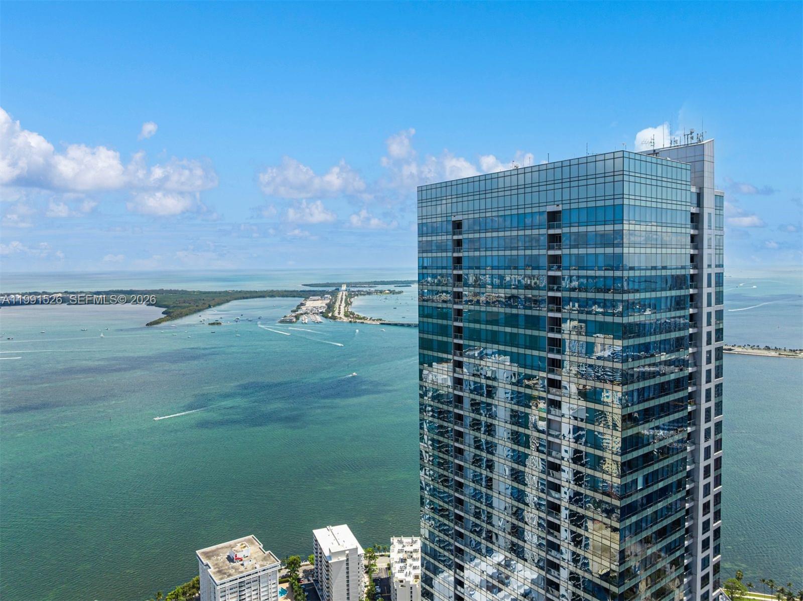 1425 Brickell Avenue, Unit PH2ABCD Miami, FL 33131 - Photo 1 of 20 a view of a city with tall buildings