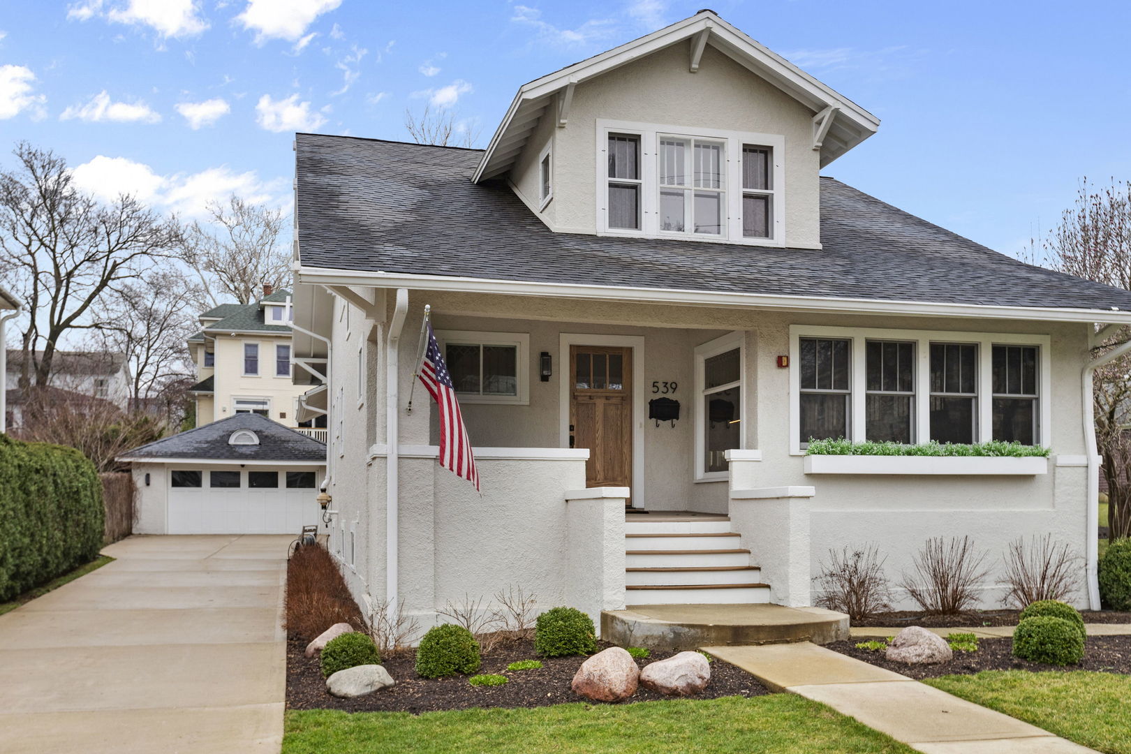 539 South Cook Street Barrington, IL 60010 - Photo 1 of 25 a front view of a house with a yard