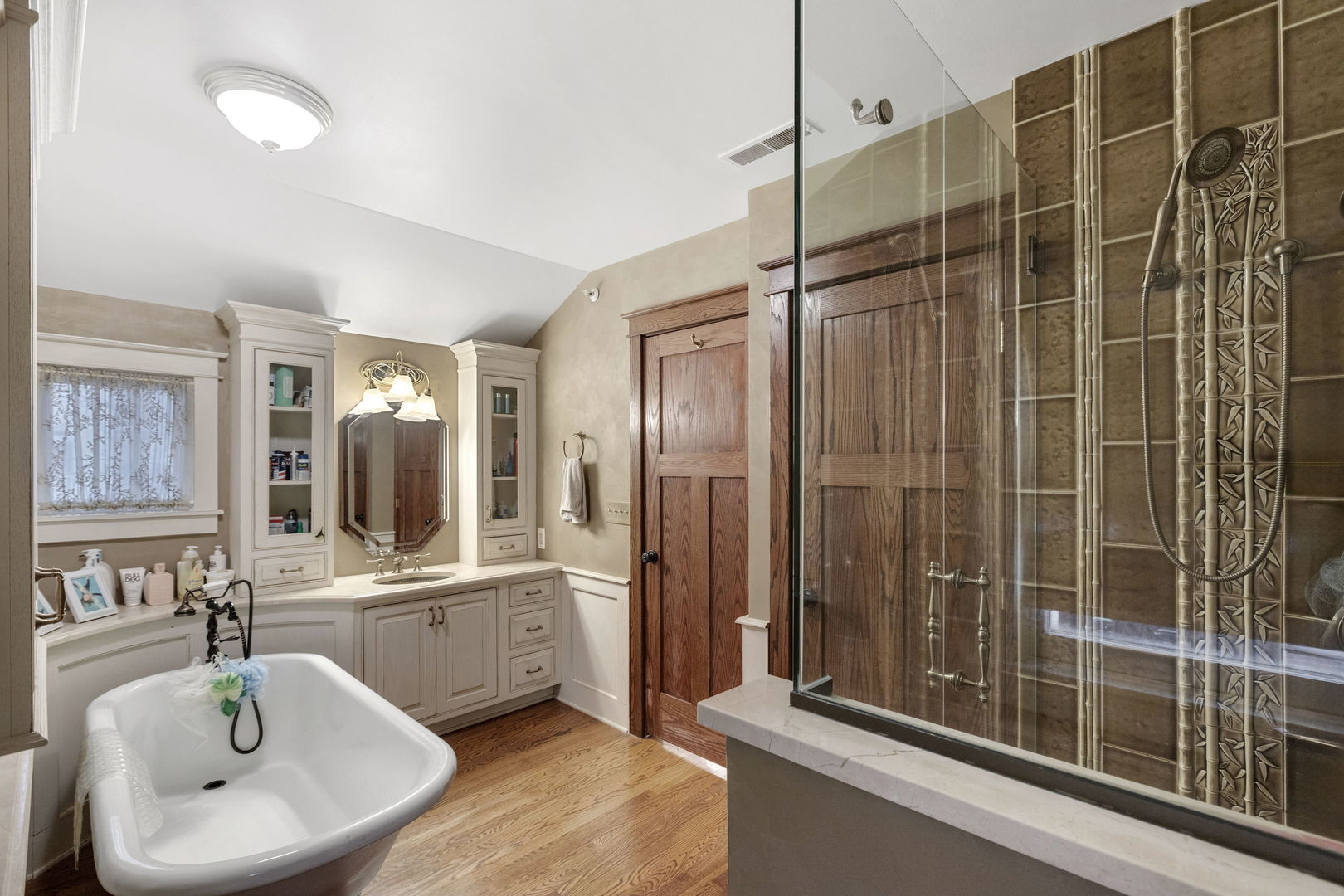 539 South Cook Street Barrington, IL 60010 - Photo 13 of 25 a bathroom with a double vanity sink and mirror