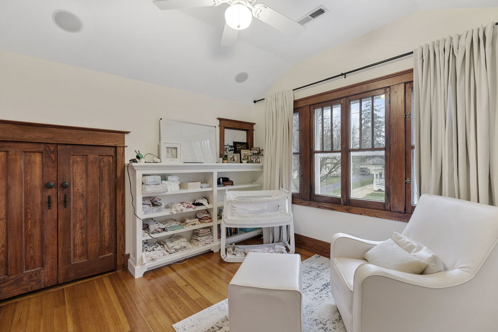 539 South Cook Street Barrington, IL 60010 - Photo 14 of 25 a bedroom with furniture and a window