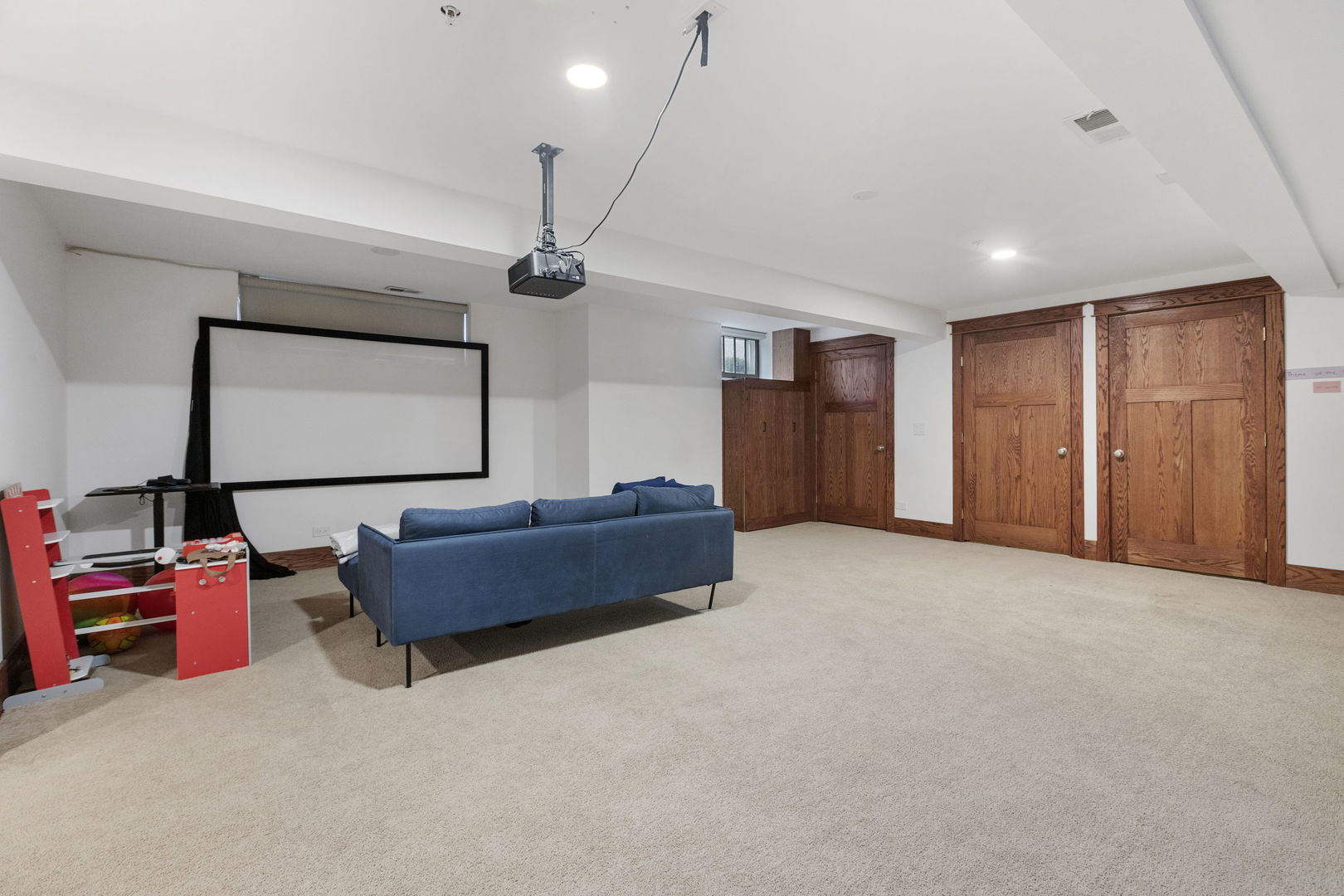 539 South Cook Street Barrington, IL 60010 - Photo 18 of 25 a living room with furniture and a flat screen tv
