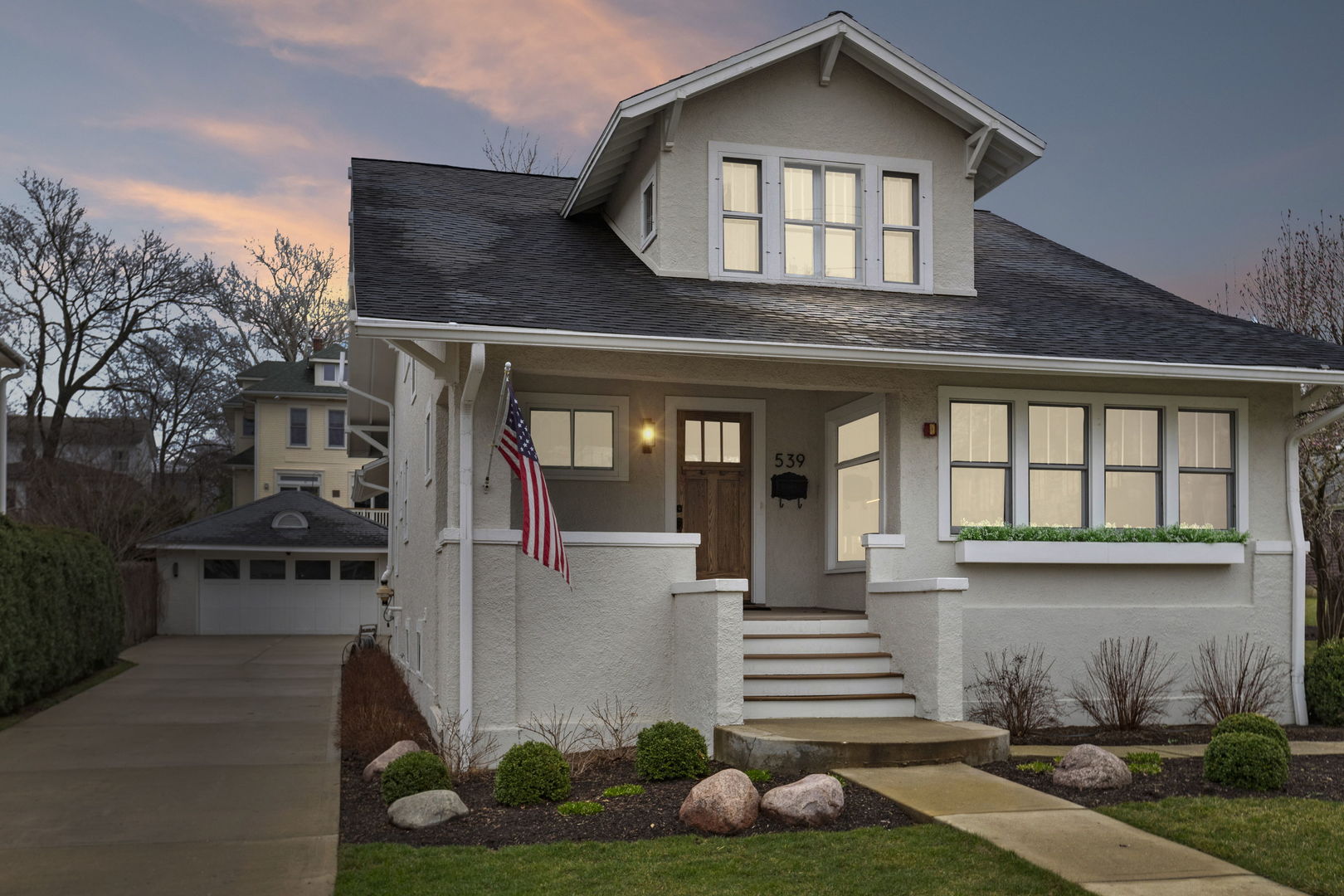 539 South Cook Street Barrington, IL 60010 - Photo 21 of 25 a front view of a house with garden