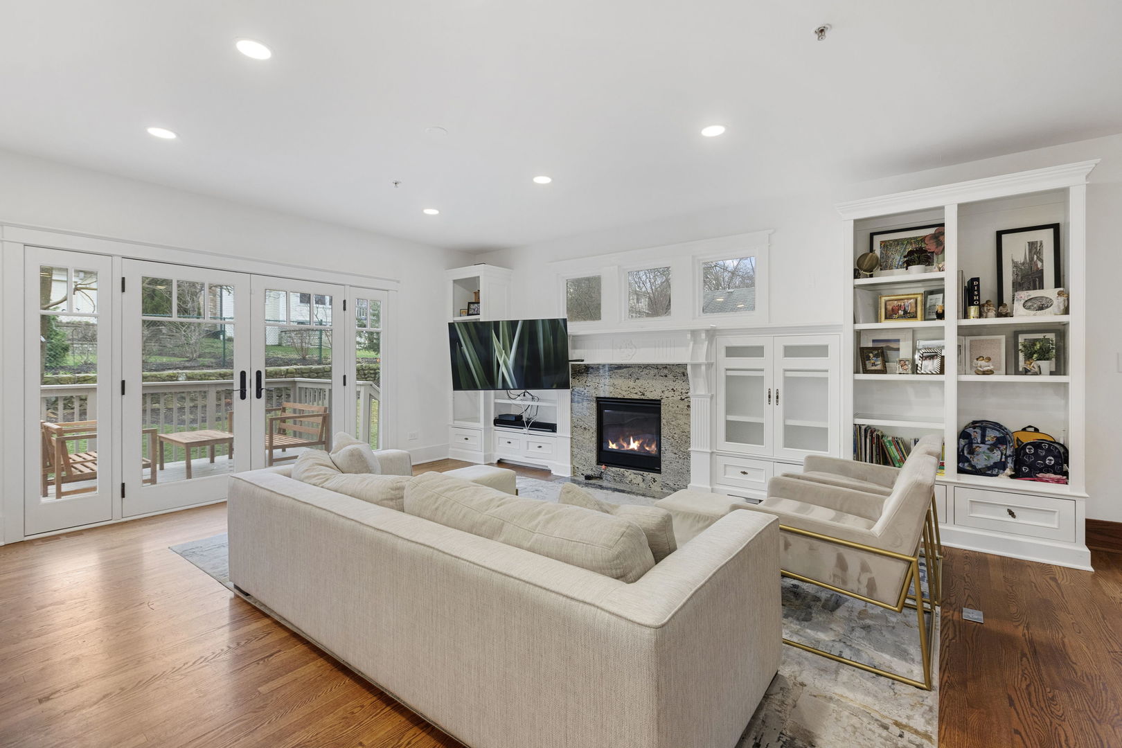539 South Cook Street Barrington, IL 60010 - Photo 6 of 25 a living room with furniture and a fireplace
