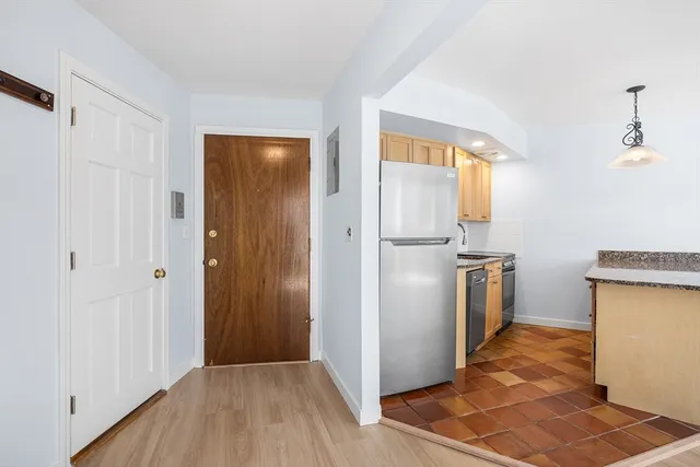 a view of a storage & utility room with a sink