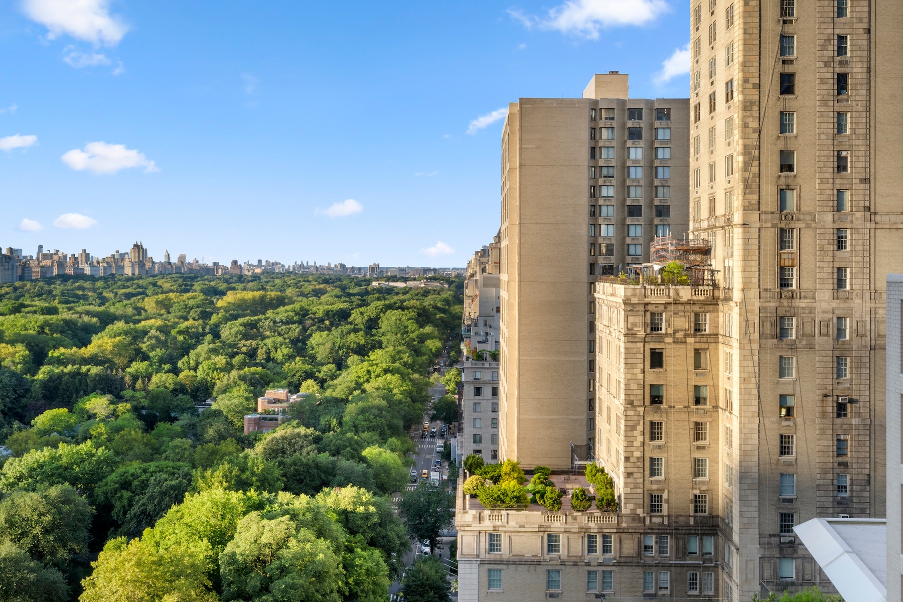781 5th Avenue, Unit 2001 Manhattan, NY 10022 - Photo 18 of 19 a view of a city with tall buildings