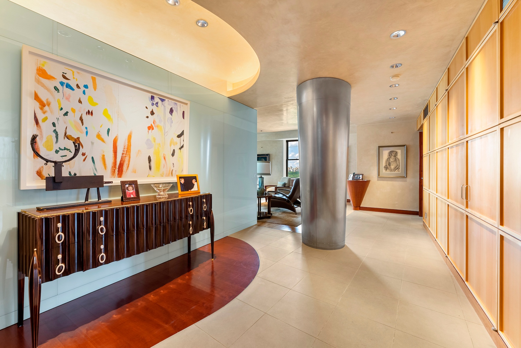 781 5th Avenue, Unit 2001 Manhattan, NY 10022 - Photo 2 of 19 a living room with furniture