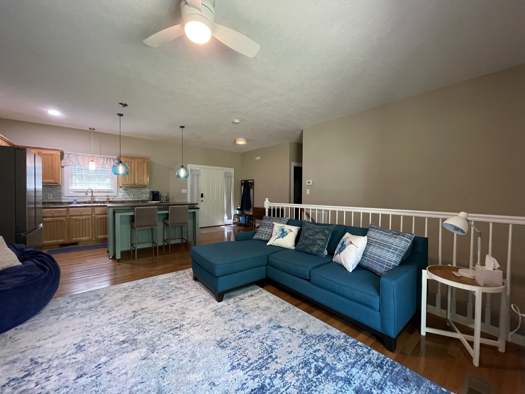 1751 Excalibur Trail Cedar Grove, TN 38321 - Photo 16 of 47 a living room with furniture and kitchen view