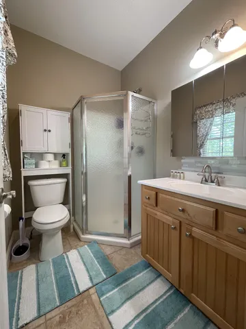 a view of a lake with mountain in the background