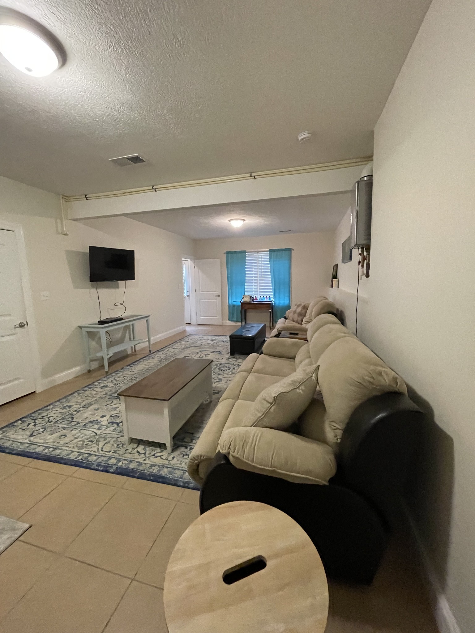 1751 Excalibur Trail Cedar Grove, TN 38321 - Photo 36 of 47 a living room with furniture and a rug