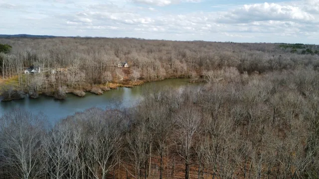 a view of a lake with mountain in the background