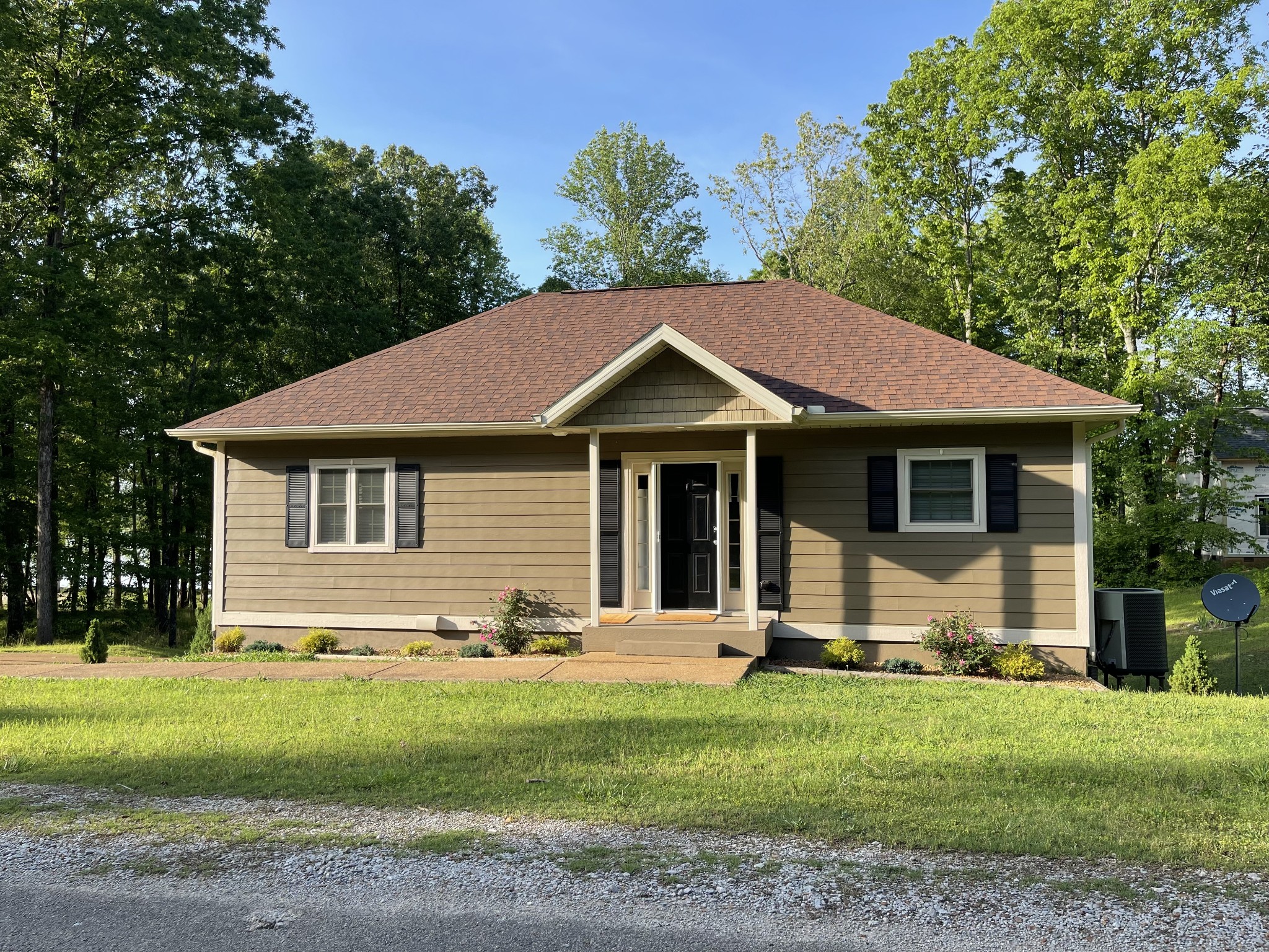 1751 Excalibur Trail Cedar Grove, TN 38321 - Photo 5 of 47 a front view of a house with a yard