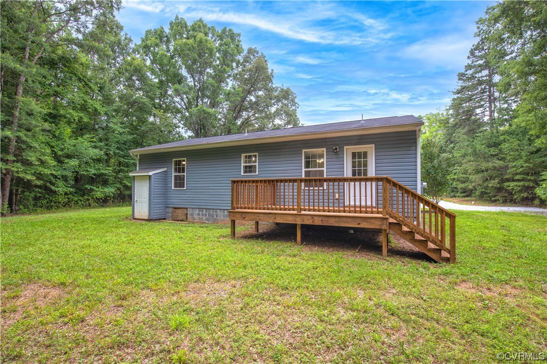 5316 Cartersville Road Powhatan, VA 23139 - Photo 19 of 21 Another view of the rear of the home and the nice deck.