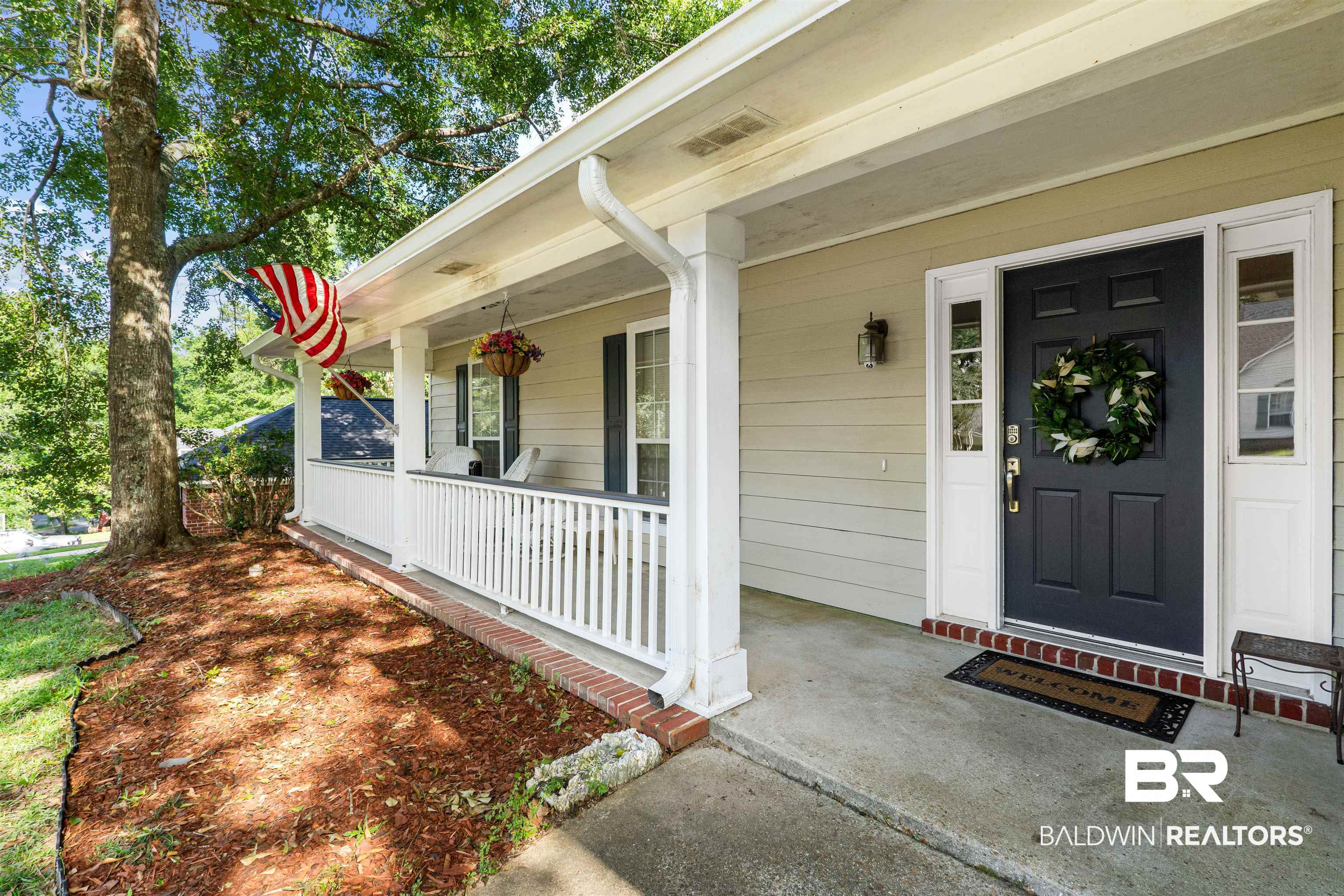 153 Lakeview Loop Daphne, AL 36526 - Photo 8 of 56 The welcoming front entry sets the tone for the comfort and care found throughout the home.