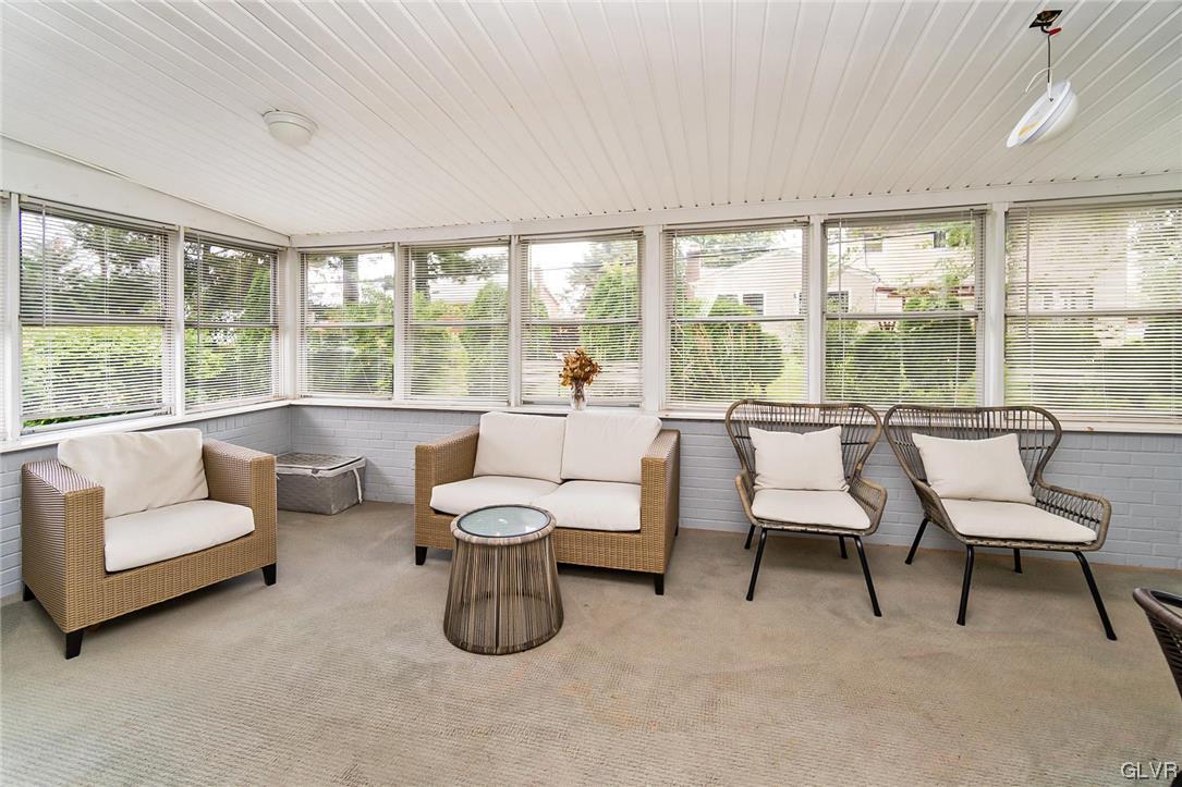 7116 Linden Road Lower Macungie Township, PA 18062 - Photo 19 of 41 a living room with furniture and a large window
