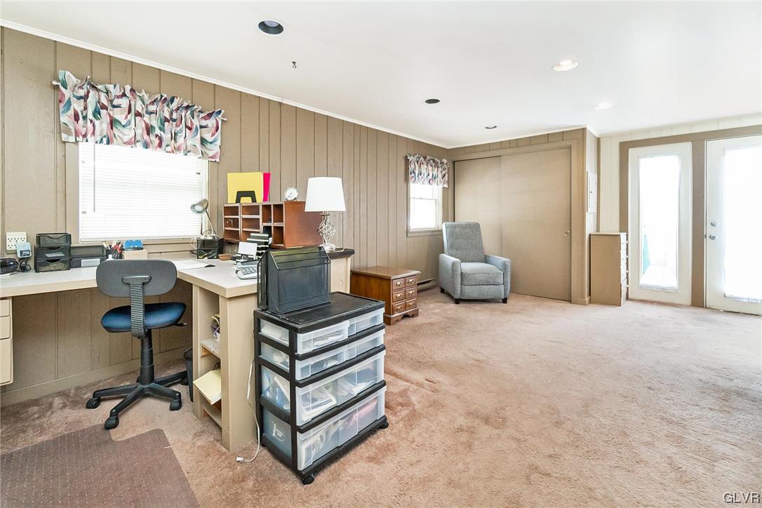 7116 Linden Road Lower Macungie Township, PA 18062 - Photo 21 of 41 a living room with furniture a window and a table
