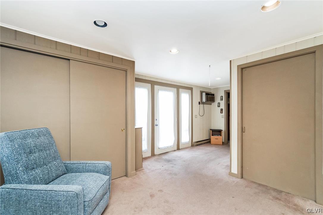 7116 Linden Road Lower Macungie Township, PA 18062 - Photo 22 of 41 a living room with furniture and a ceiling fan