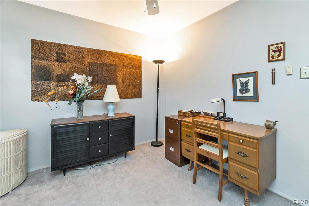 7116 Linden Road Lower Macungie Township, PA 18062 - Photo 30 of 41 a room with a dresser and a flat screen tv