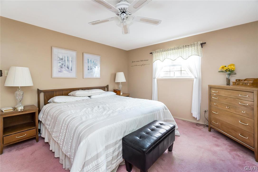 7116 Linden Road Lower Macungie Township, PA 18062 - Photo 32 of 41 a bedroom with a bed and a dresser