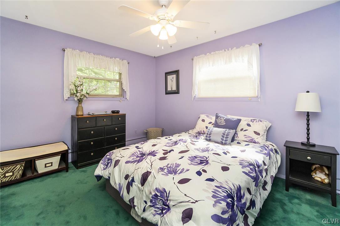 7116 Linden Road Lower Macungie Township, PA 18062 - Photo 33 of 41 a bedroom with a bed and a tv