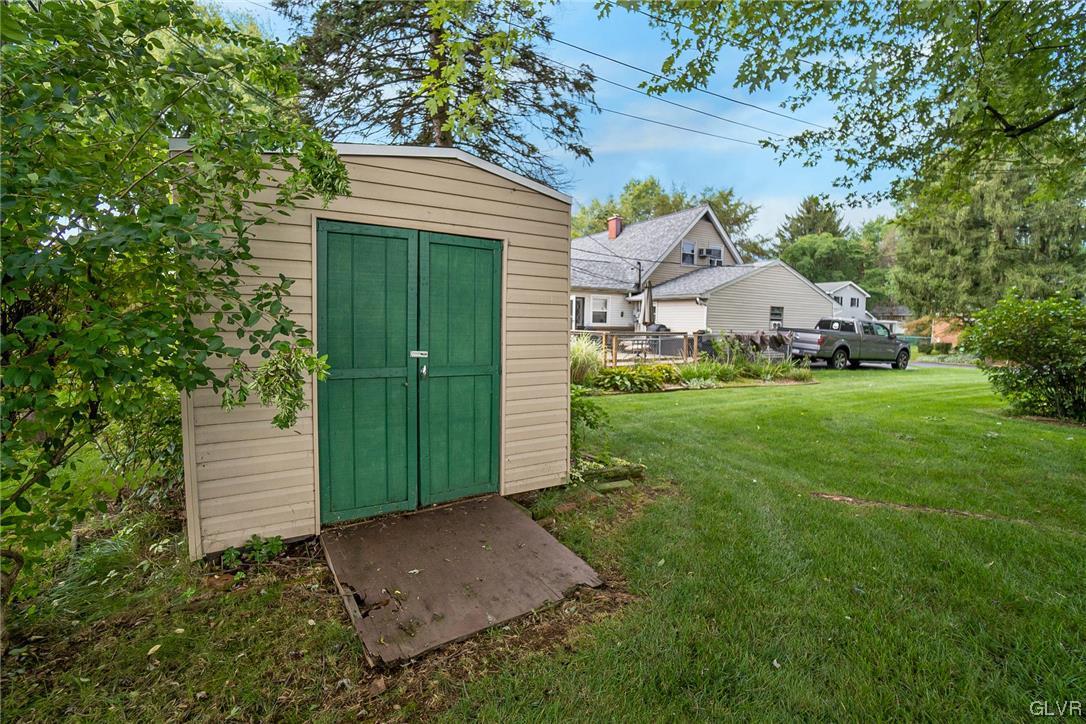 7116 Linden Road Lower Macungie Township, PA 18062 - Photo 38 of 41 a front view of a house with a yard