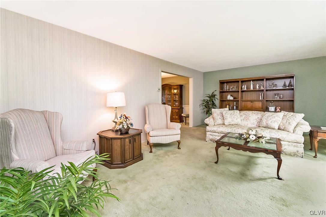 7116 Linden Road Lower Macungie Township, PA 18062 - Photo 4 of 41 a living room with furniture and a potted plant
