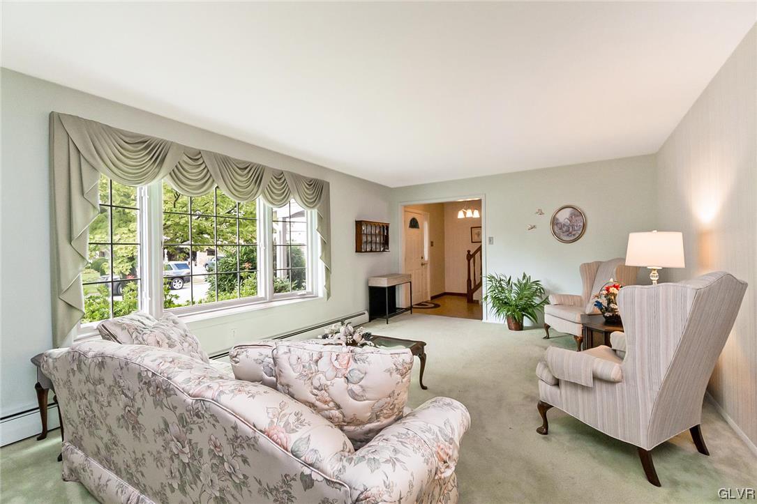 7116 Linden Road Lower Macungie Township, PA 18062 - Photo 5 of 41 a living room with furniture and a large window