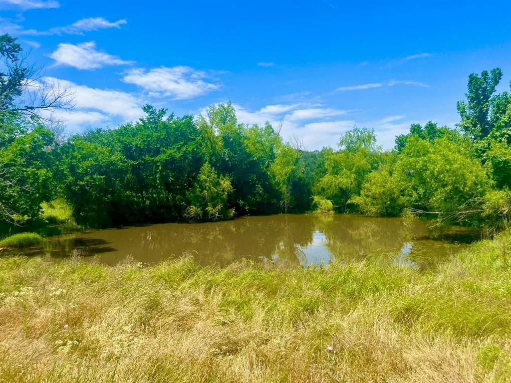 View of landscape with a water view