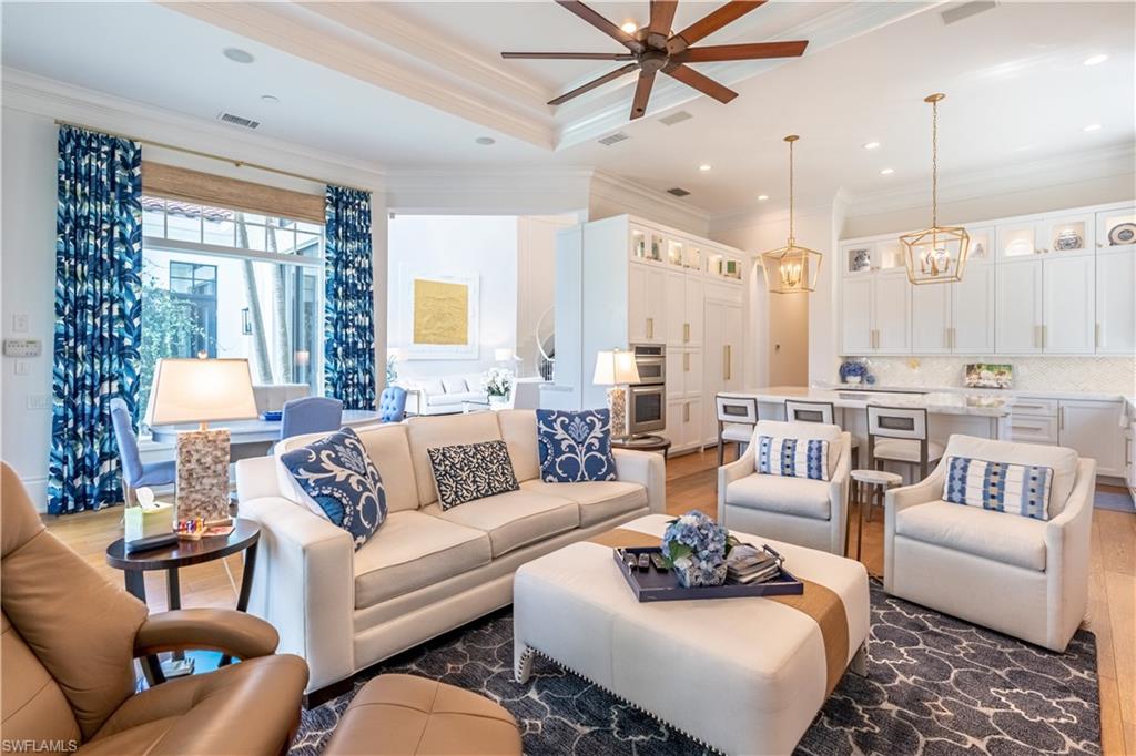 2125 Modena Court Naples, FL 34105 - Photo 14 of 50 a living room with furniture and a large window