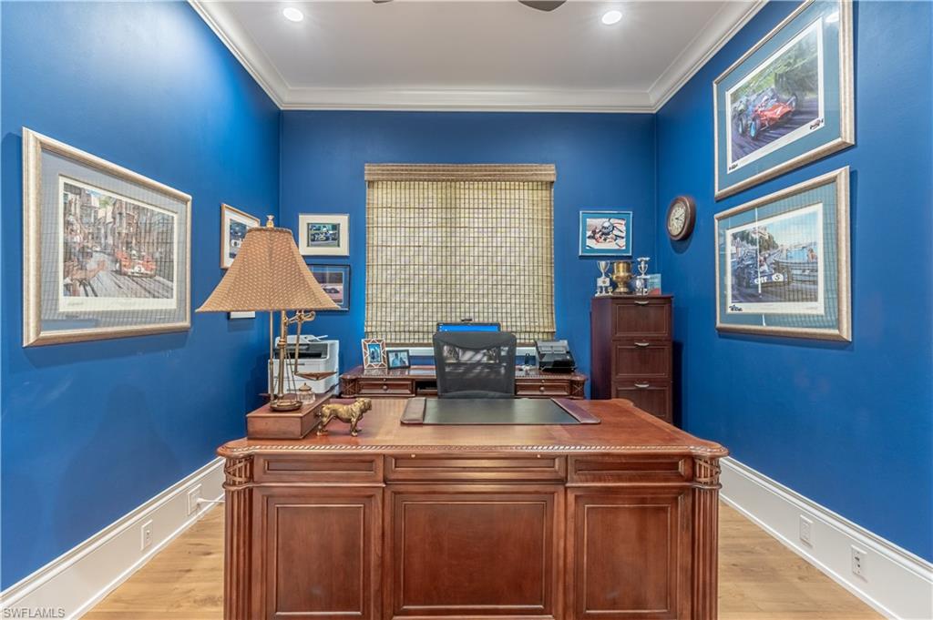 2125 Modena Court Naples, FL 34105 - Photo 20 of 50 a kitchen with stainless steel appliances furniture a refrigerator and a window