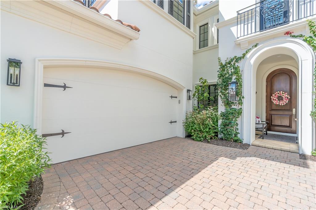 2125 Modena Court Naples, FL 34105 - Photo 2 of 50 a view of entryway with garden