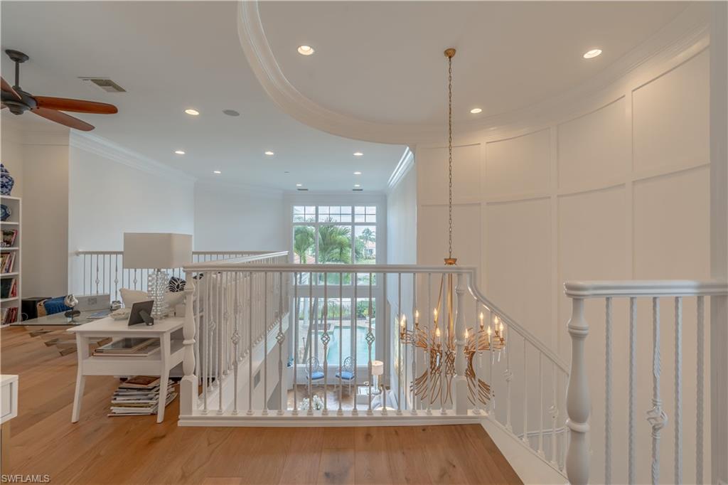 2125 Modena Court Naples, FL 34105 - Photo 30 of 50 a view of a living room and a floor to ceiling window