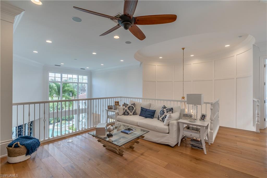 2125 Modena Court Naples, FL 34105 - Photo 31 of 50 a living room with furniture and a large window