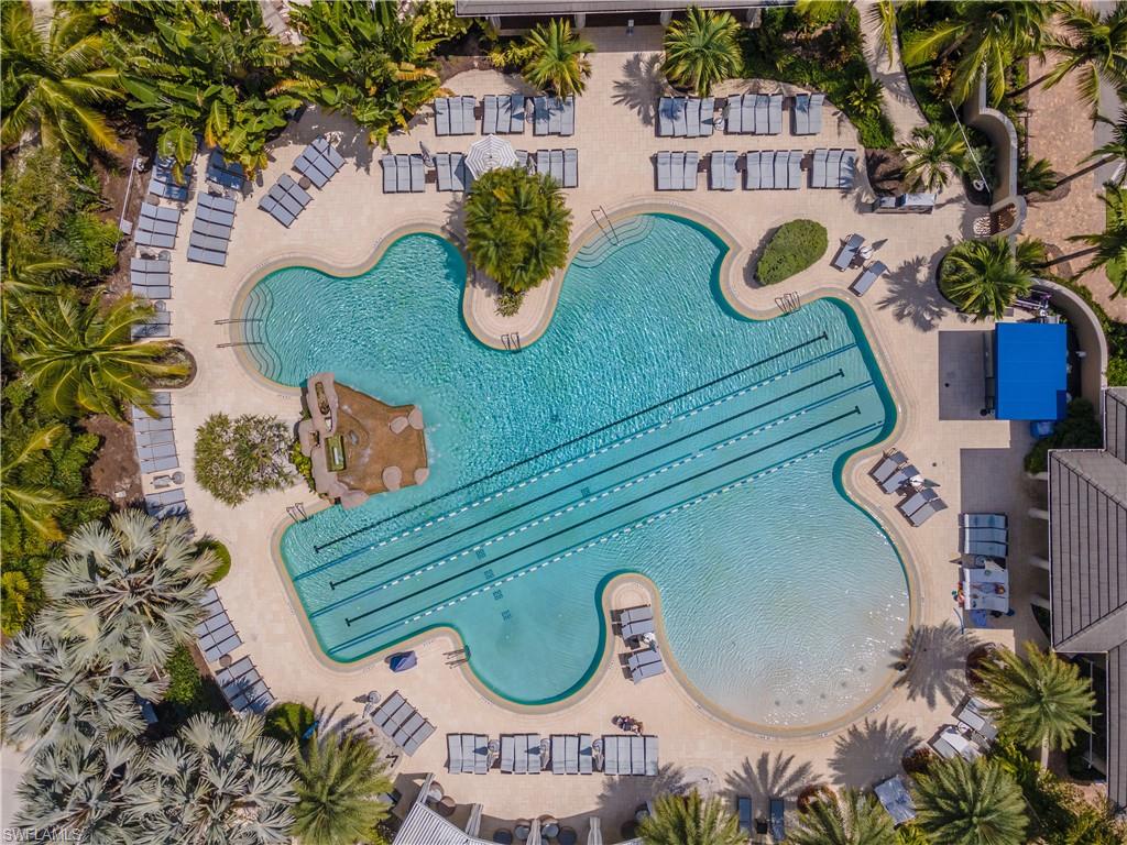 2125 Modena Court Naples, FL 34105 - Photo 46 of 50 a bathroom with a sink and mirror