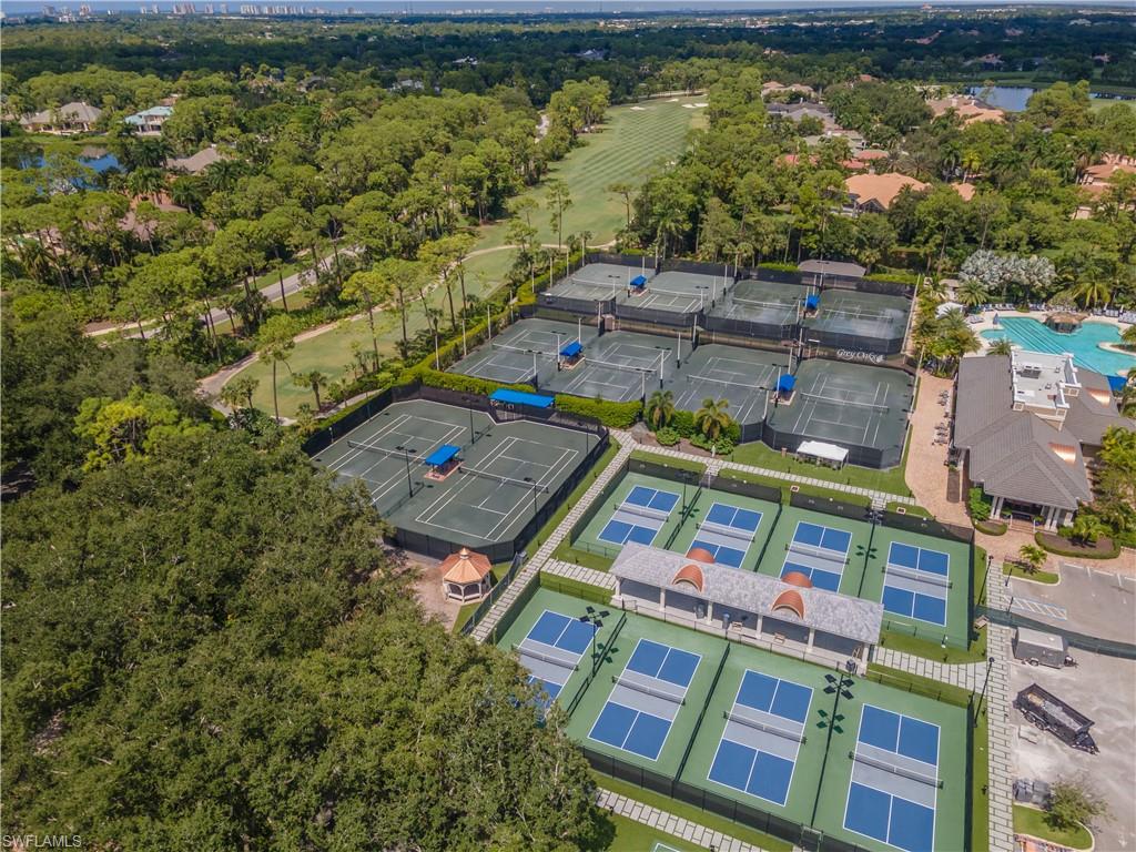 2125 Modena Court Naples, FL 34105 - Photo 47 of 50 an aerial view of residential houses with outdoor space