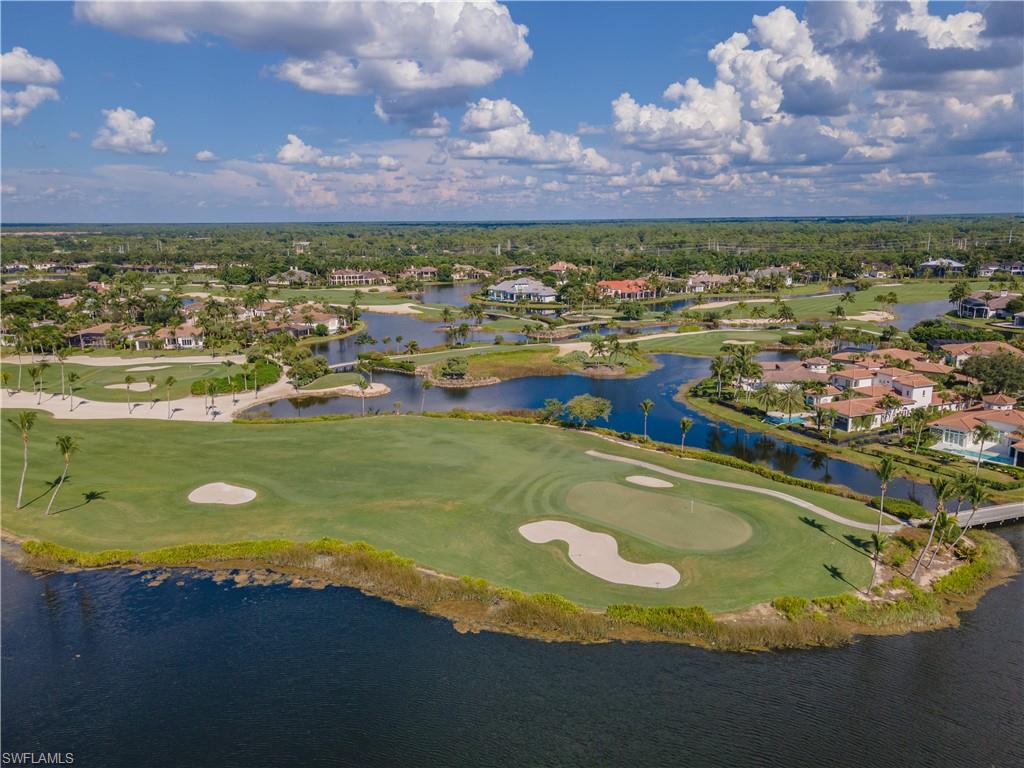 2125 Modena Court Naples, FL 34105 - Photo 48 of 50 a view of a lake with a city view