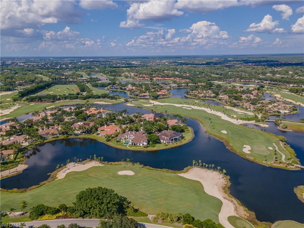 2125 Modena Court Naples, FL 34105 - Photo 50 of 50 an aerial view of residential houses with outdoor space and lake view
