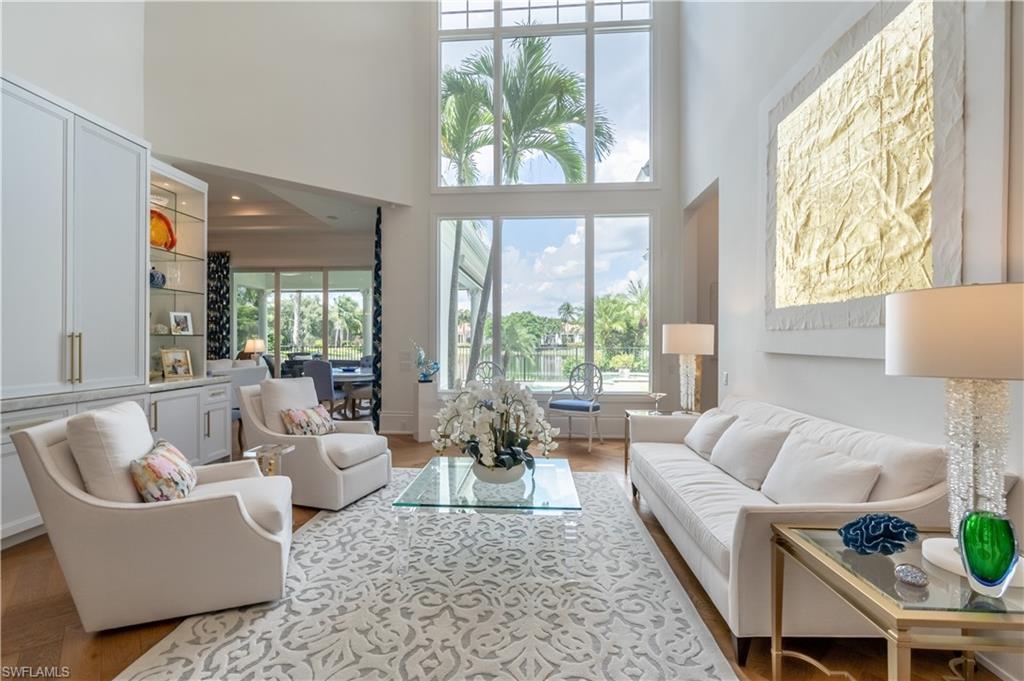 2125 Modena Court Naples, FL 34105 - Photo 7 of 50 a living room with furniture and a large window