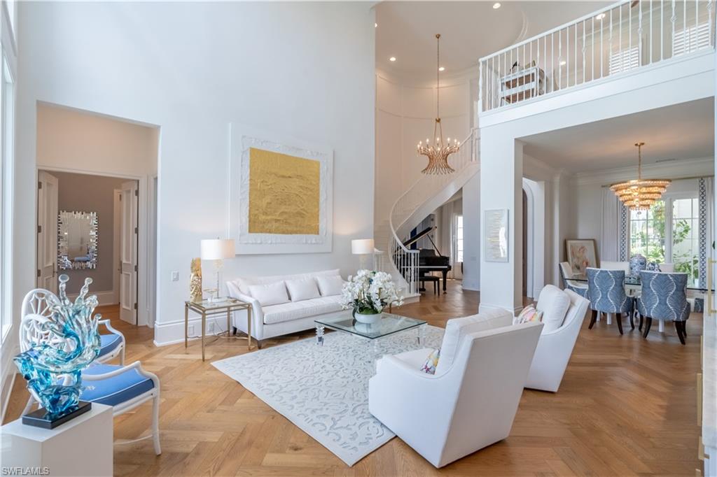2125 Modena Court Naples, FL 34105 - Photo 8 of 50 a living room with furniture and wooden floor