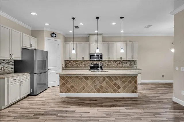 $635,000 | 9902 Craftsman Park Way, Palmetto, FL 34221