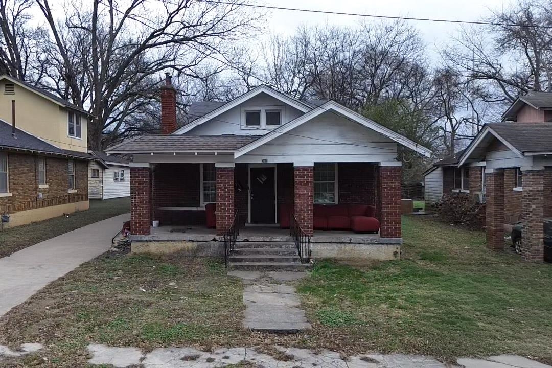 702 Atlantic Street Memphis, TN 38112 - Photo 1 of 1 a front view of a house with garden