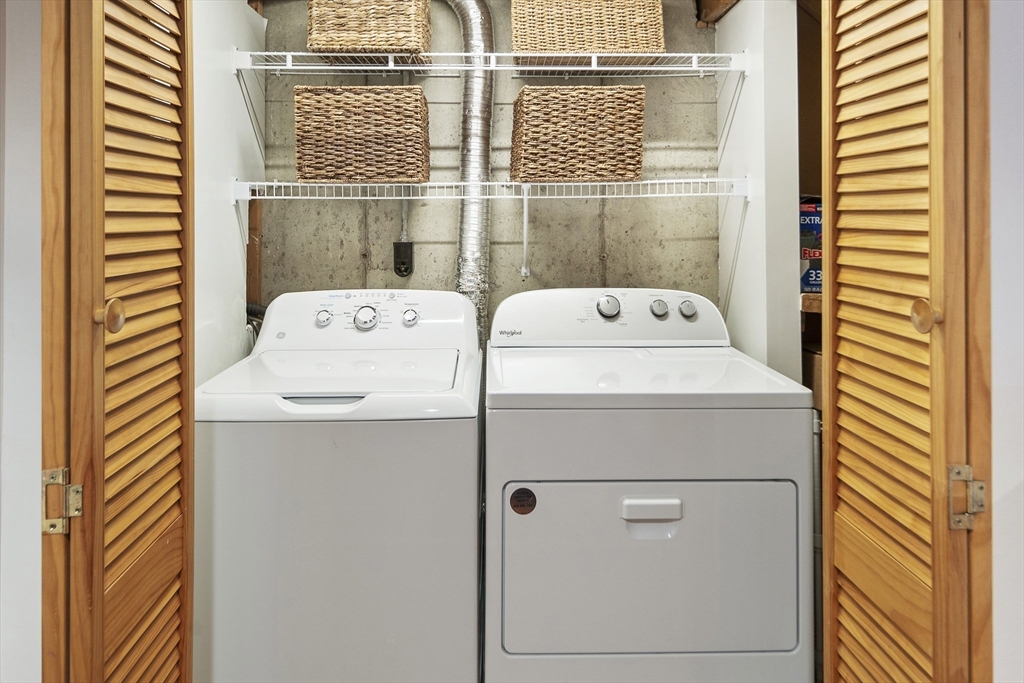 120 Medford Street, Unit 120 Arlington, MA 02474 - Photo 19 of 25 a utility room with dryer and washer