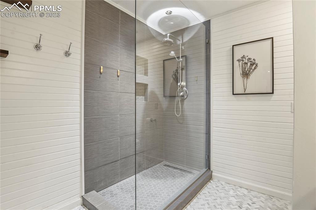 450 Jack Boot Road Monument, CO 80132 - Photo 24 of 45 a bathroom with a shower