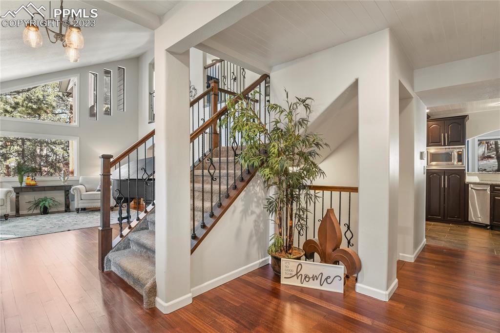 450 Jack Boot Road Monument, CO 80132 - Photo 3 of 45 a view of entryway livingroom and hallway with wooden floor