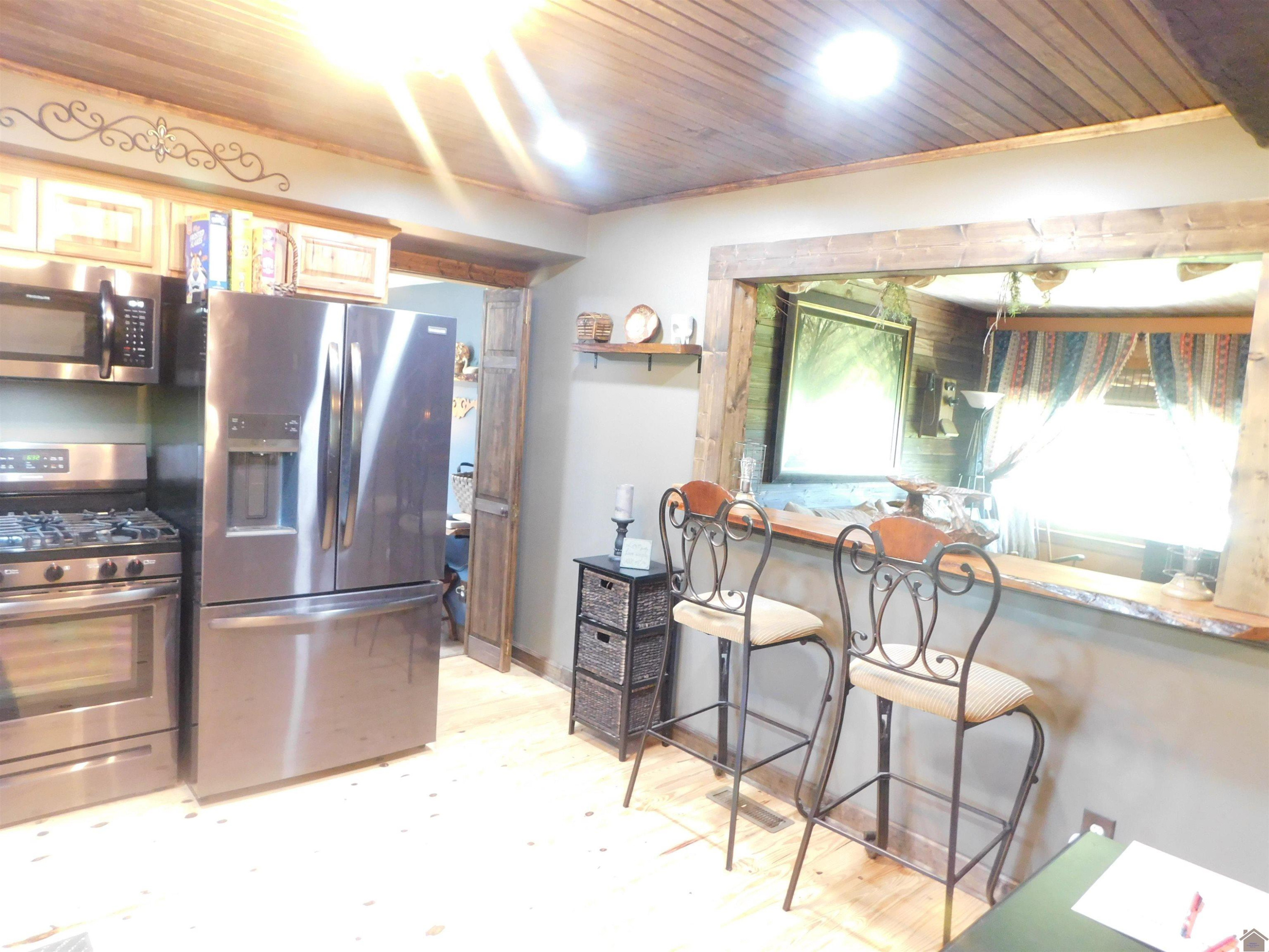 4075 Radio Road Almo, KY 42020 - Photo 13 of 29 BAR AREA BETWEEN KITHCNE AND LIVINGROOM