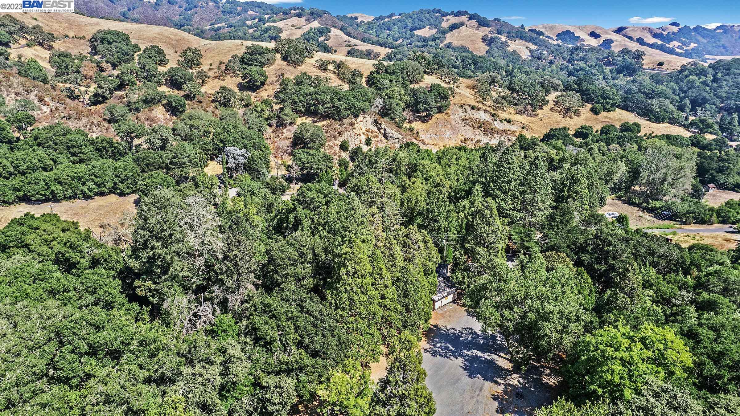 18235 Bollinger Canyon Road San Ramon, CA 94583 - Photo 1 of 1 an aerial view of a house with a yard