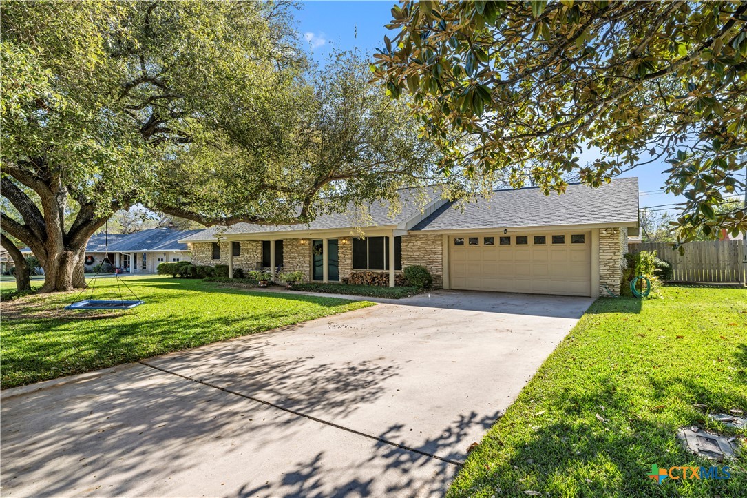 2601 Linwood Road Temple, TX 76502 - Photo 2 of 41 a front view of a house with a yard and garage