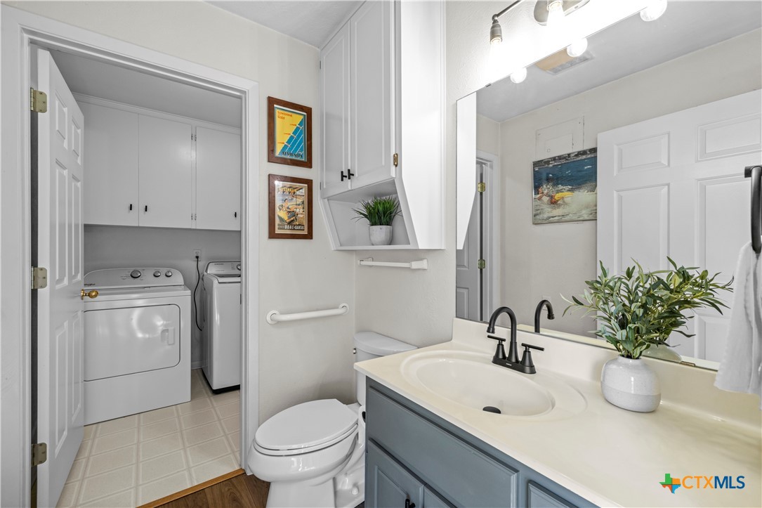 2601 Linwood Road Temple, TX 76502 - Photo 21 of 41 a bathroom with a sink toilet and mirror